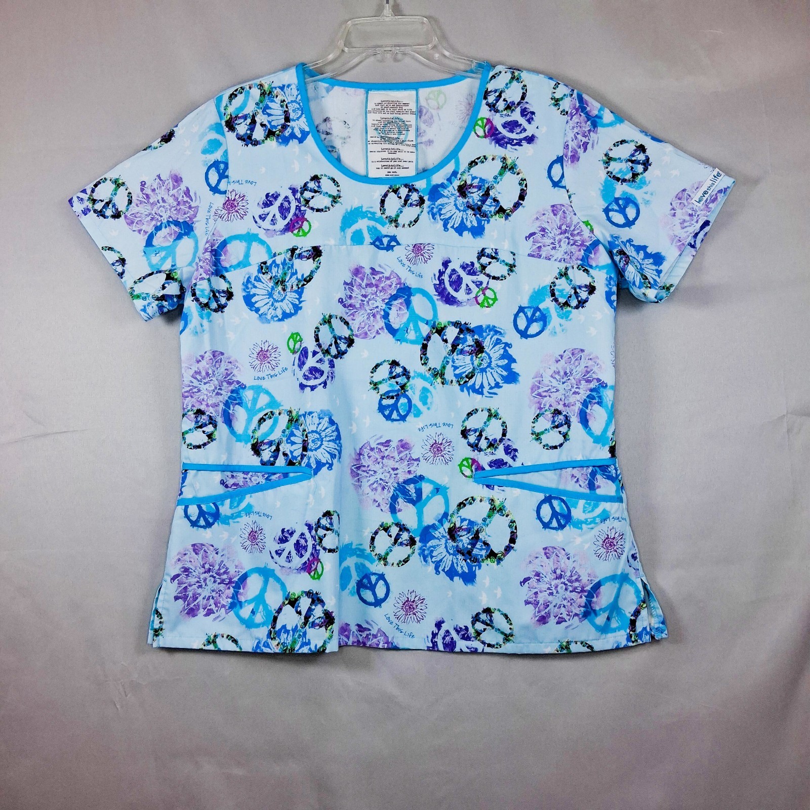 Love This Life Scrub Top Women’s L Pastel Blue Peace Signs Pockets Medical
