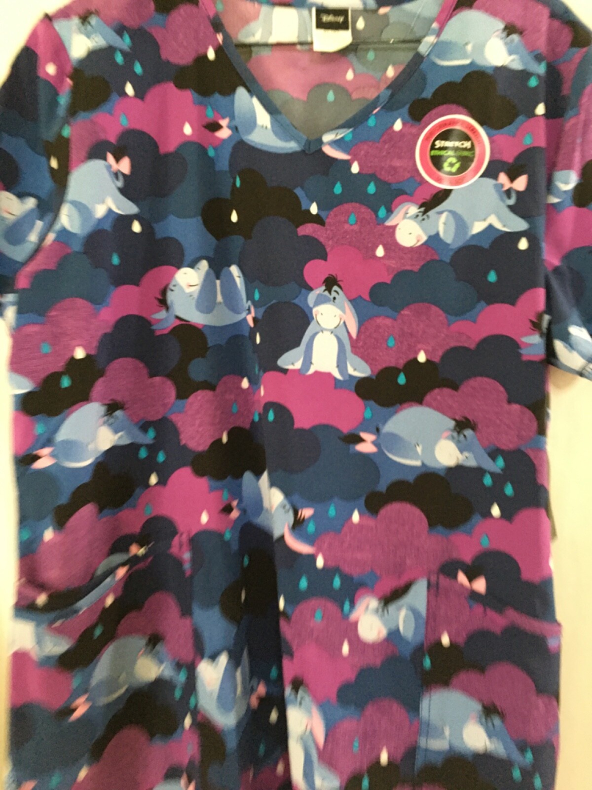 DISNEY Eeyore Women’s V-Neck Stretch Pockets Scrub Top Indigo many sizes NEW